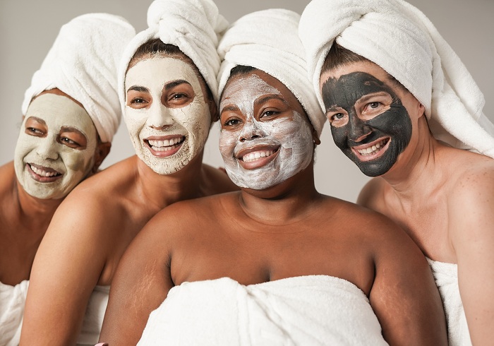 A group of women wearing face masks