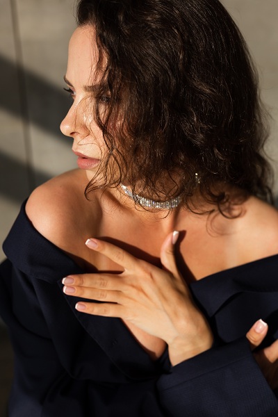 Pretty woman with smooth face wearing black