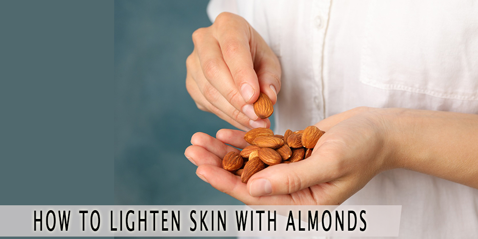 Woman holding a handful of almonds